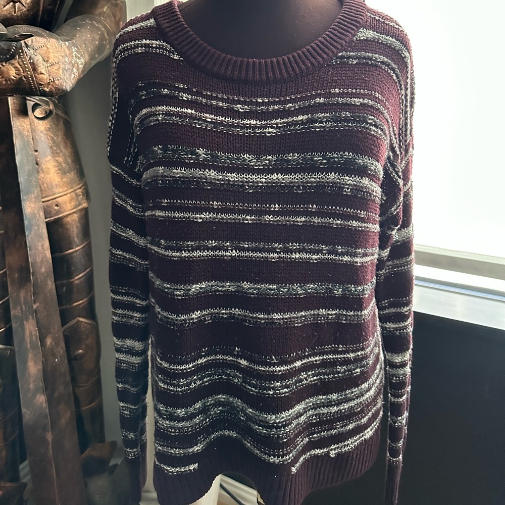 Purplish brown striped Calvin Klein sweater. Size large. Soft and cozy.